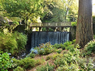 Bridge and waterfall at Bodnant Gardens 