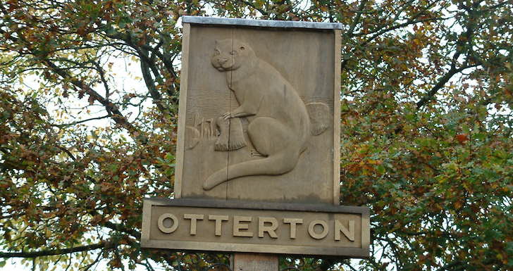 Wooden sign for Otterton Mill Devon