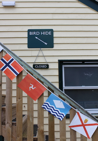 Staircase with flag bunting leading to the bird hide