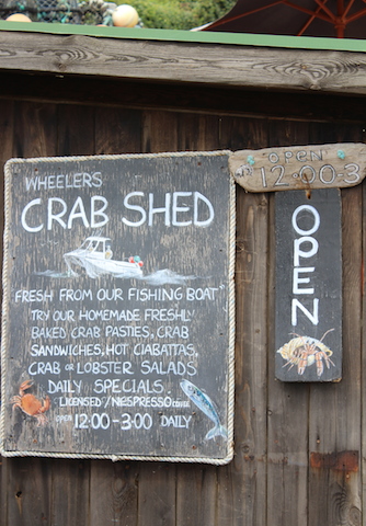 Restaurant signage at Wheelers Crab Shed at Steephill Cove 