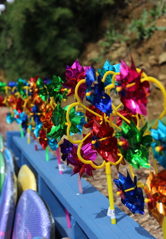 Colourful windmills and surf boards