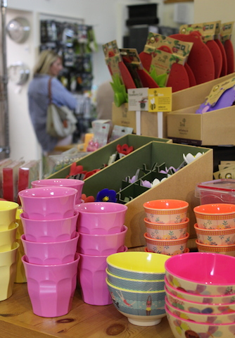 Colourful plastic glasses and bowls