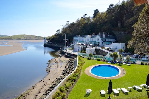 Portmeirion Hotel with circular swimming pool and Dywryd estuary view