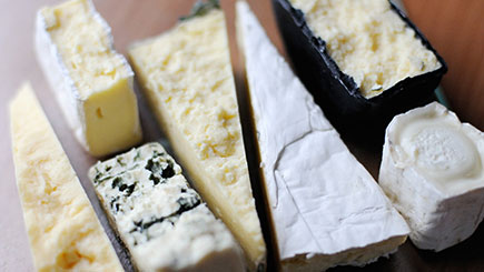 Platter of traditional British cheeses to taste on the Bermondsey tour
