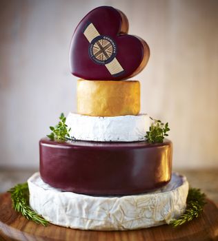 a tower of different cheese for a party or celebration