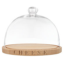 glass cheese dome and wooden cheese board