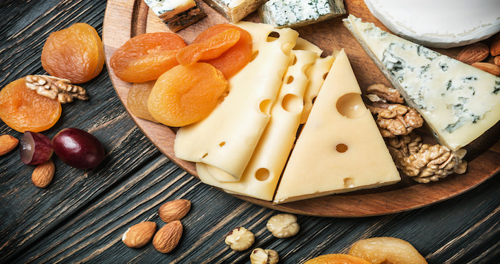 platter of cheese apricots and nuts