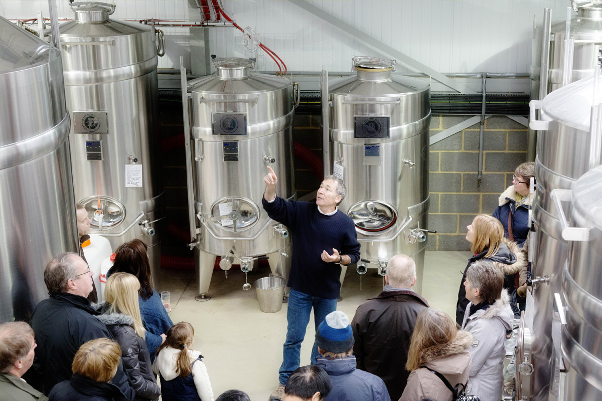 Visitors on a tour of Hush Heath Winery in Kent